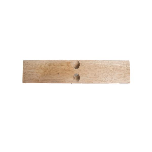 Top view of a rectangular wooden block with two holes