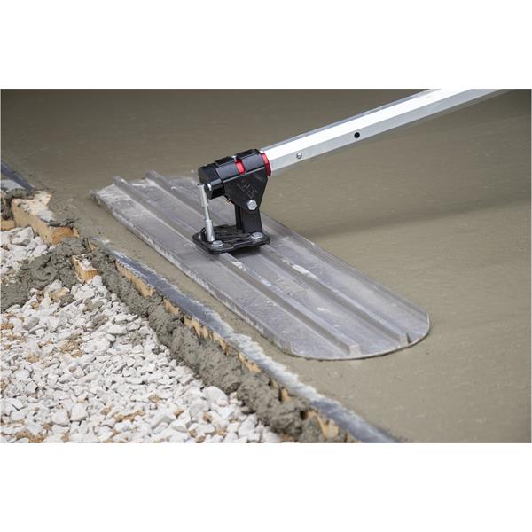 Marshalltown Rock-It 2.0 attached to a handle smoothing concrete surface