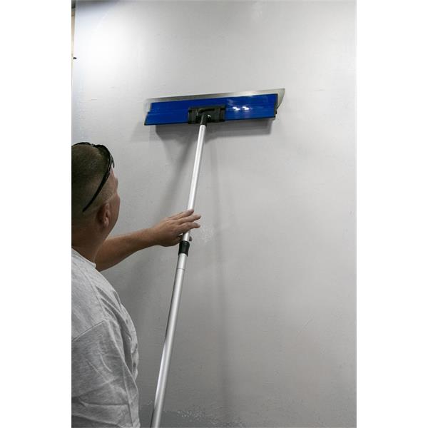 Person using MARSHALLTOWN ProSkim™ Handle on a wall