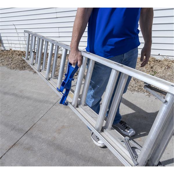 Person using a MARSHALLTOWN Lift Lender™ to carry a ladder easily