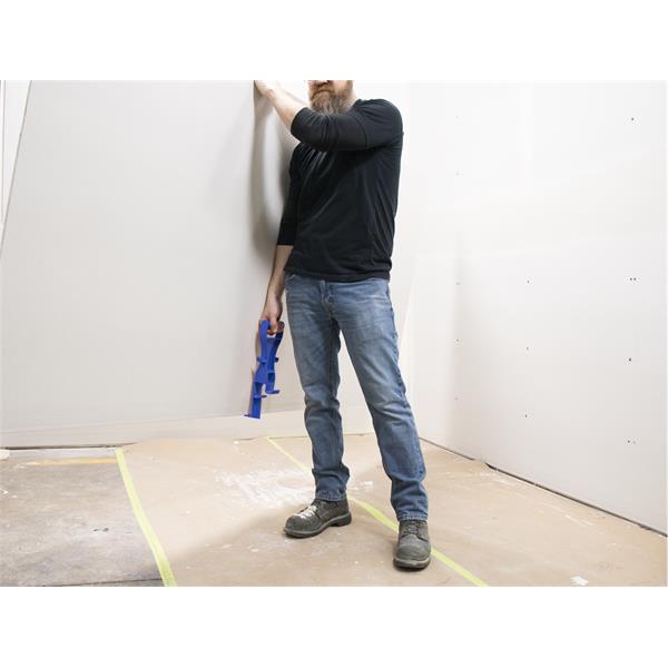 Person using MARSHALLTOWN Lift Lender™ to support drywall installation