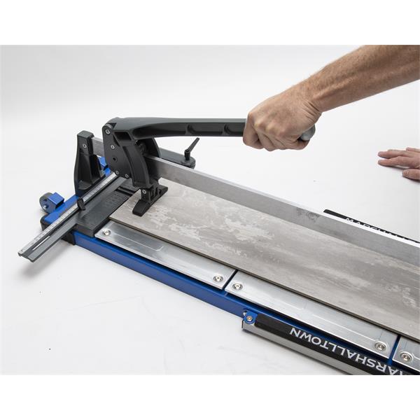 User operating a MARSHALLTOWN 48" Pro Tile Cutter on a tile