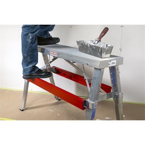 WAL-BOARD TOOLS aluminum folding bench in use during construction