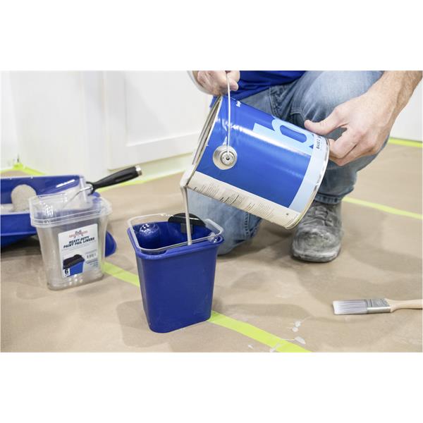 Paint being poured into a MARSHALLTOWN heavy-duty paint pail liner